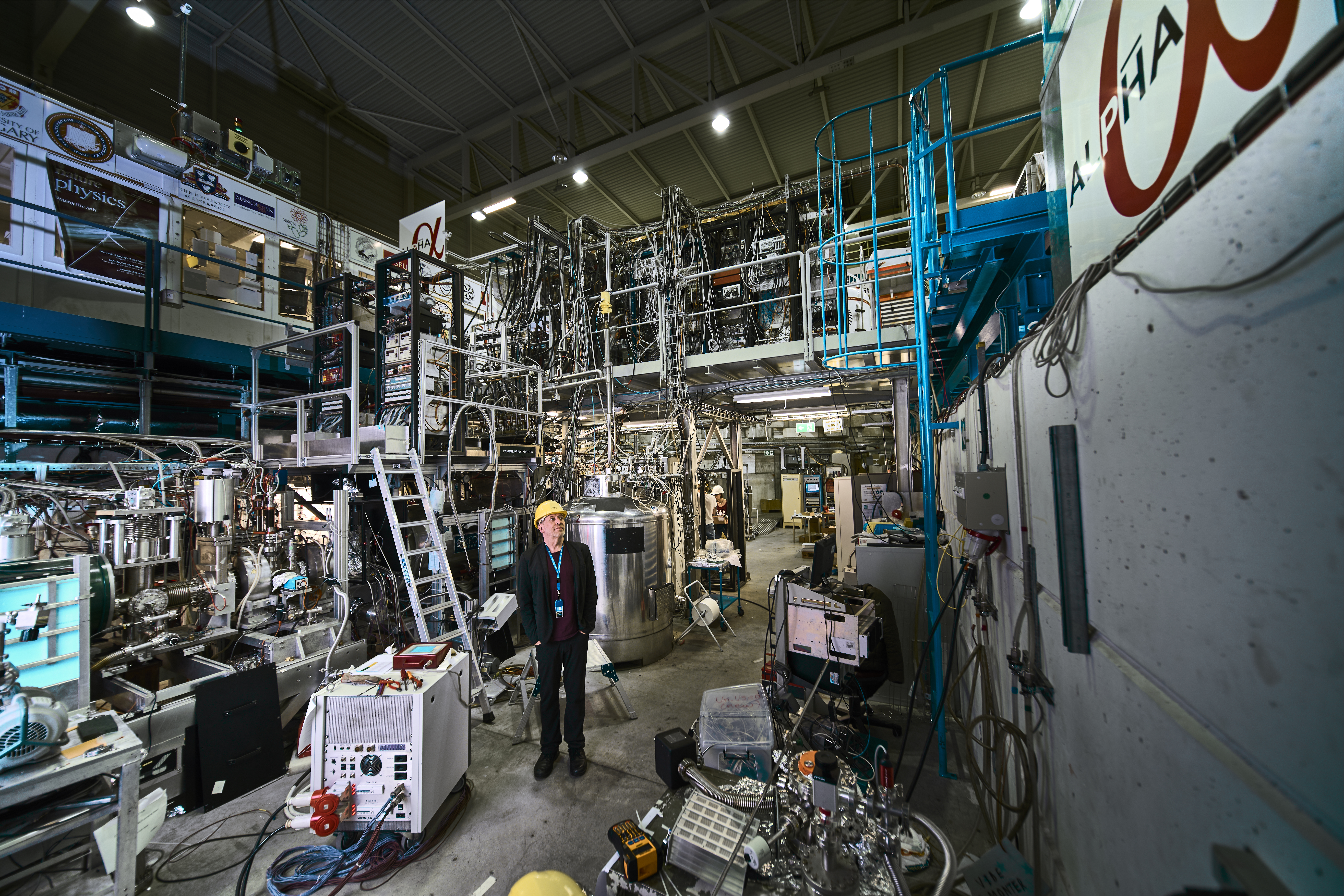 Jeffrey Hangst, spokesperson for the ALPHA experiment, next to the experiment. (Image: Maximilien Brice, Julien Ordan/CERN)