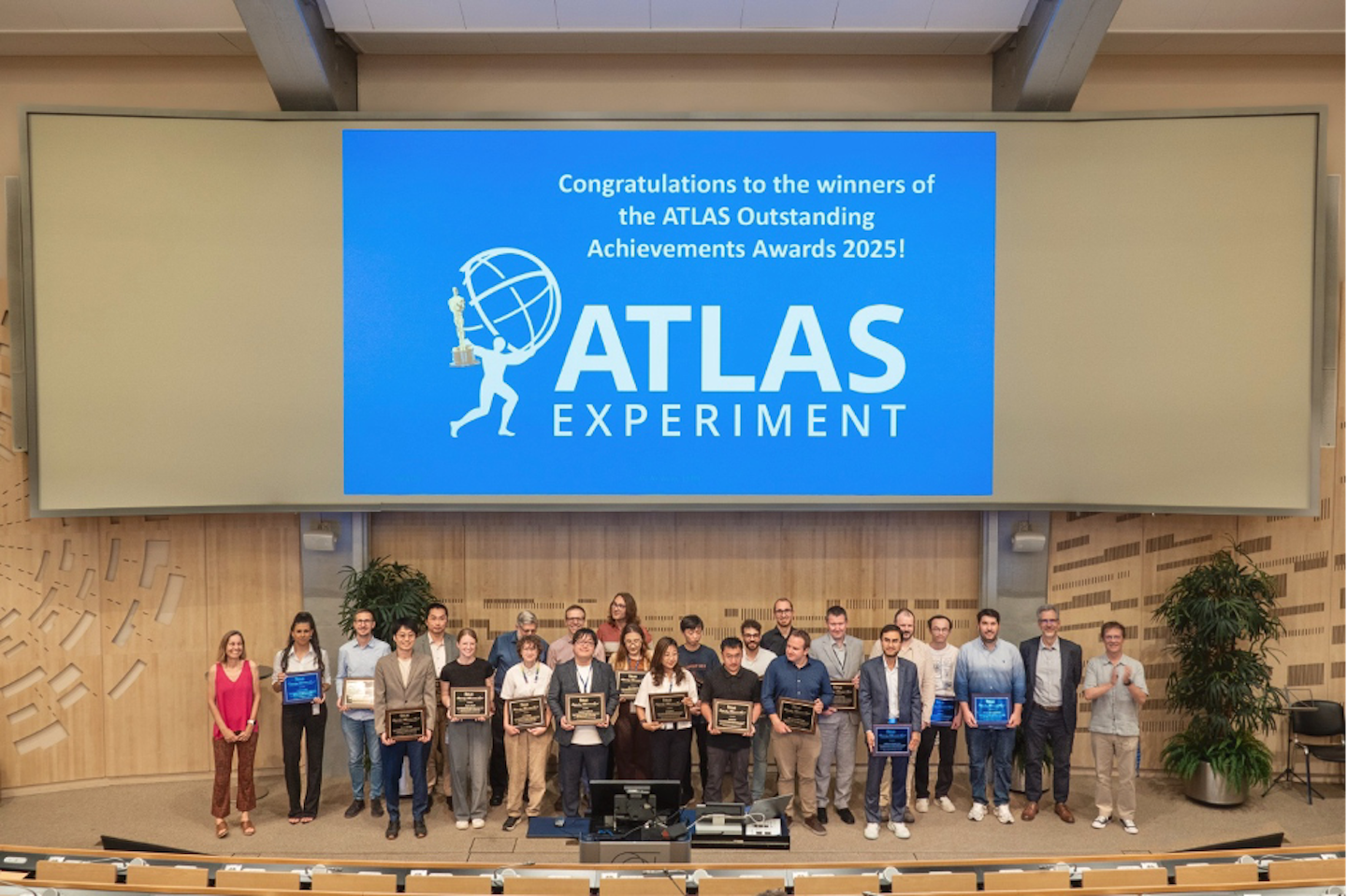 Group photo in CERN's Main Auditorium