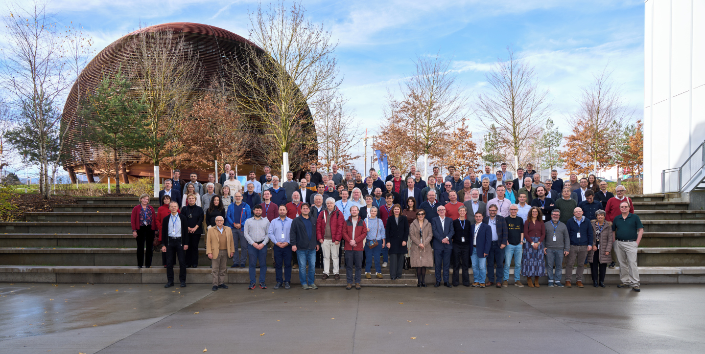 Group of people in front of the Globe of science and innovation at CERN