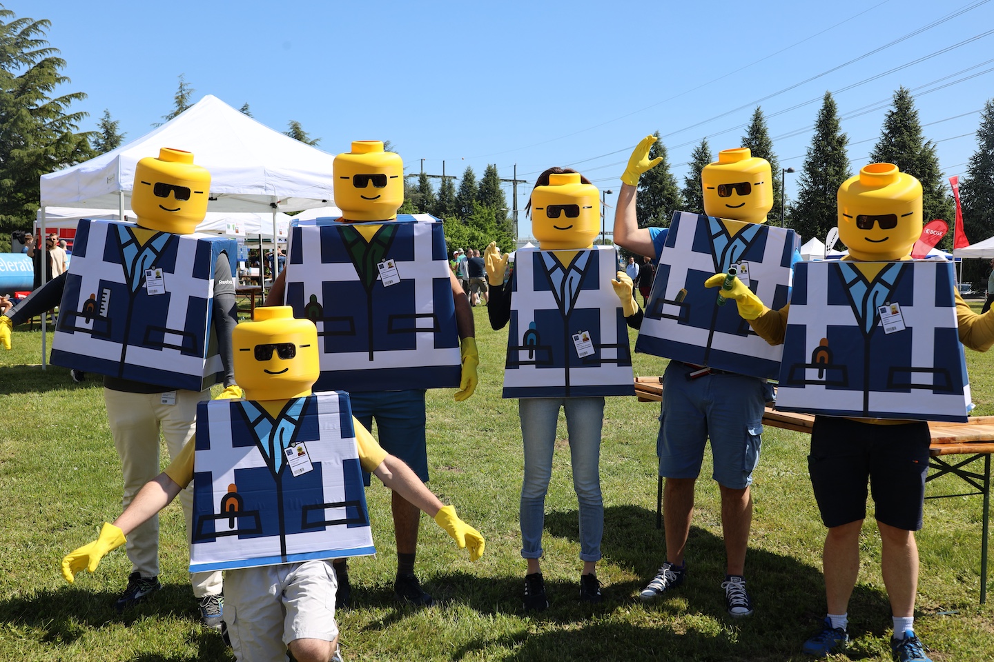 6 people dressed as Lego figures