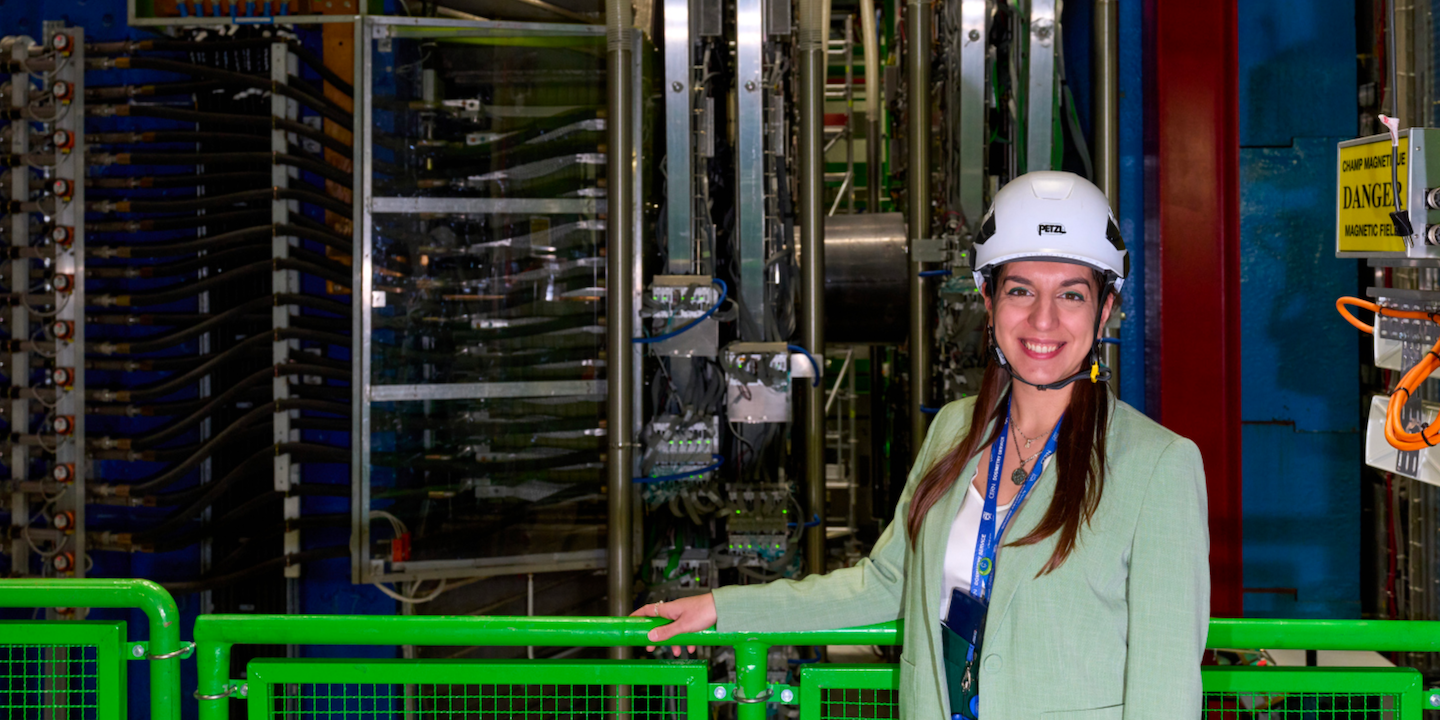 Livia, physicist at ALICE, inside the underground hall of her experiment 